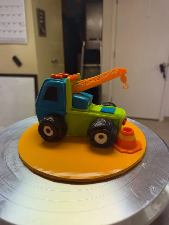 Sculpted tow truck cake
